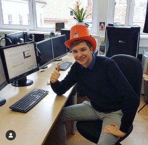 First day of work, wearing the offices 'crazy hat'